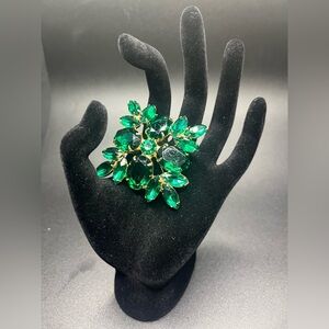 vintage emerald green rhinestone brooch large gold tone statement pin. 1960s
